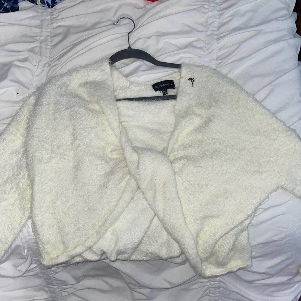 Twist top off the shoulder cover up sweater